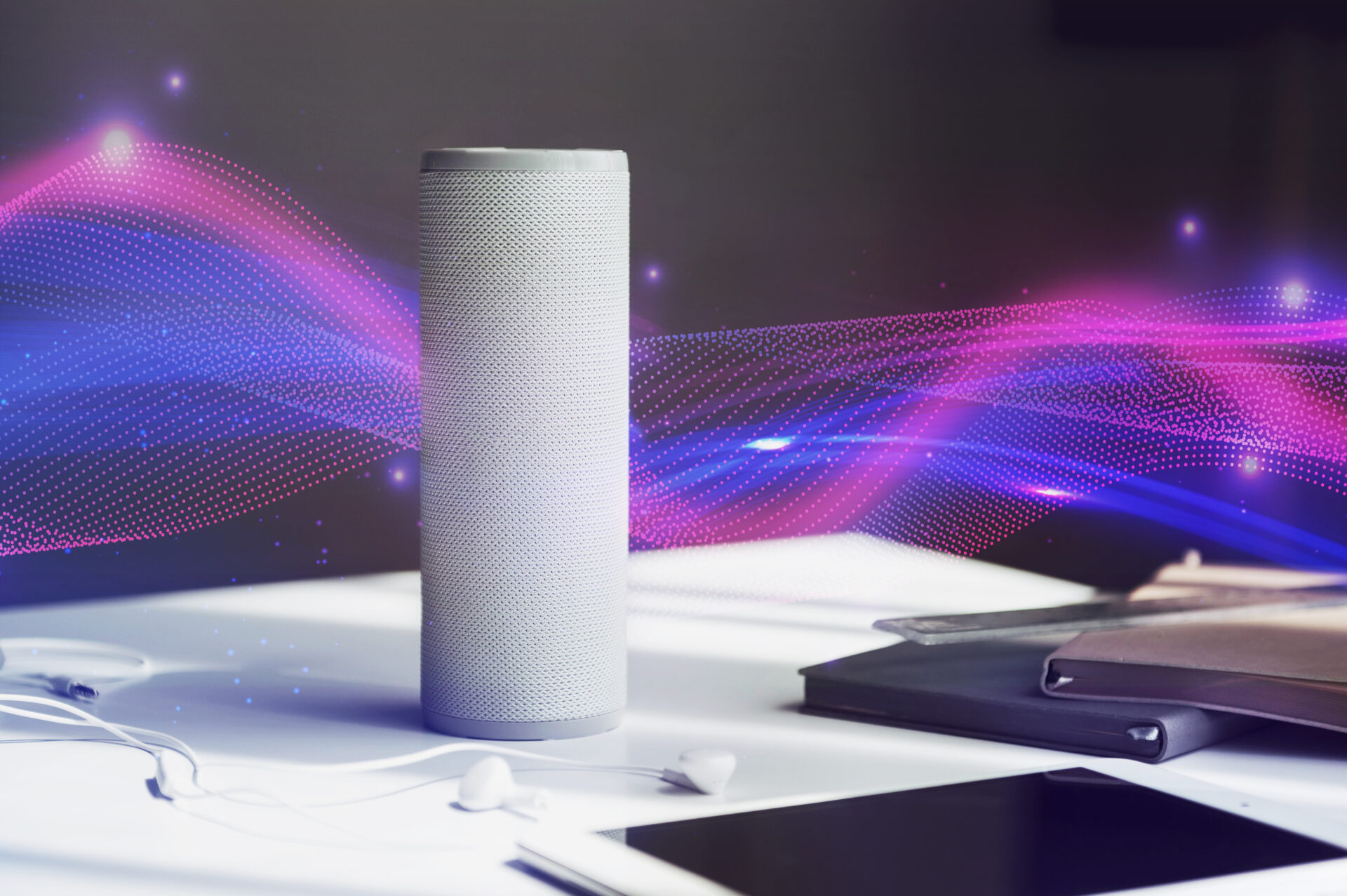 Voice assistance device with LLM Voice Assistance technology on a wooden table, surrounded by workspace essentials.